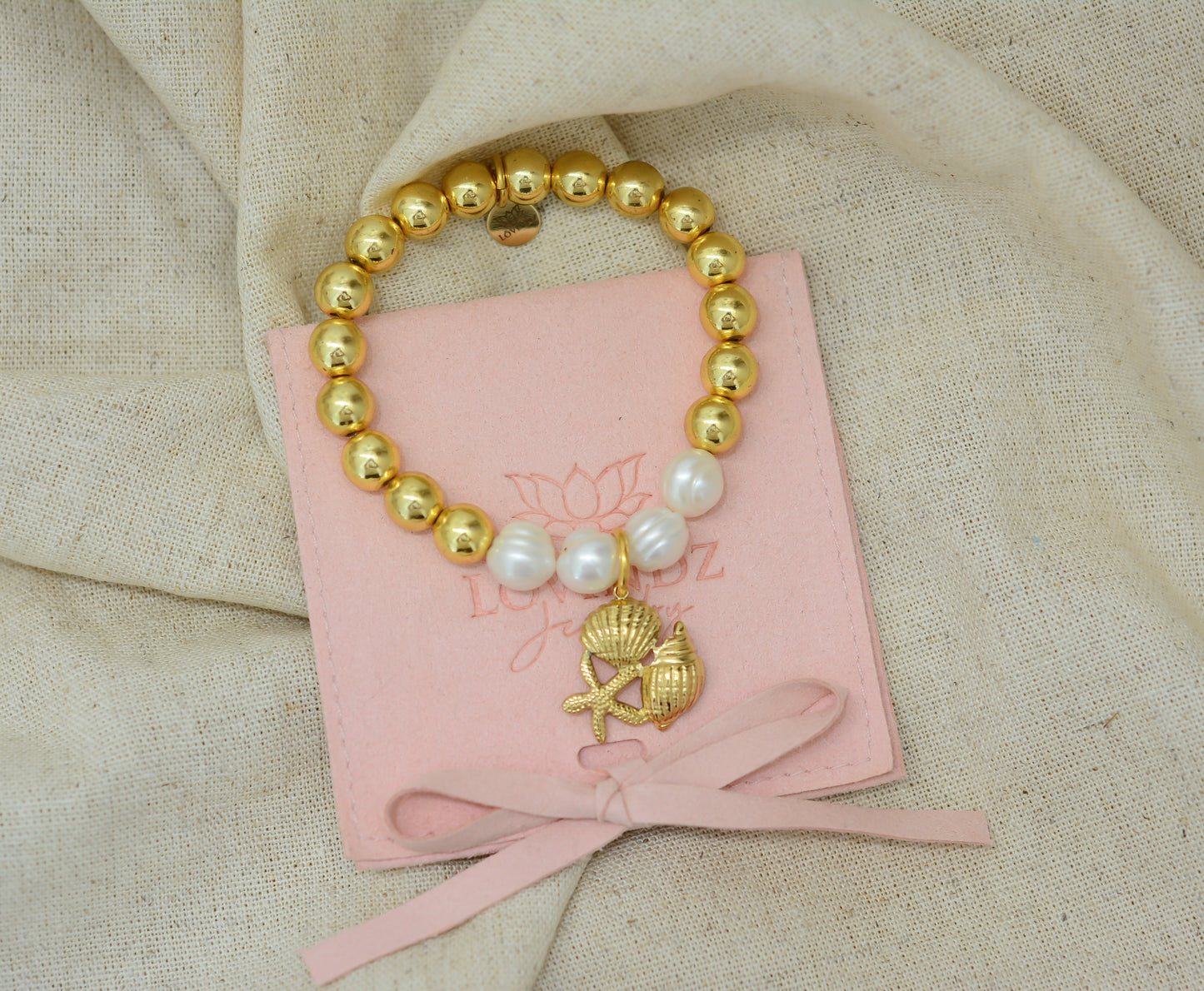 Pulsera concha, estrella y caracol