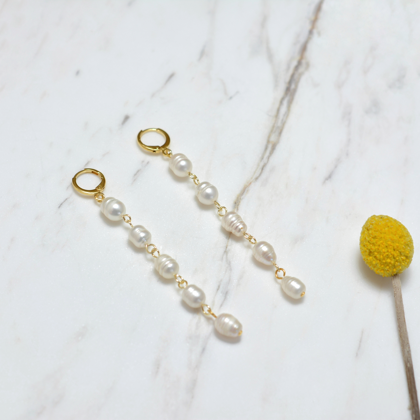 Aretes largos perla de río