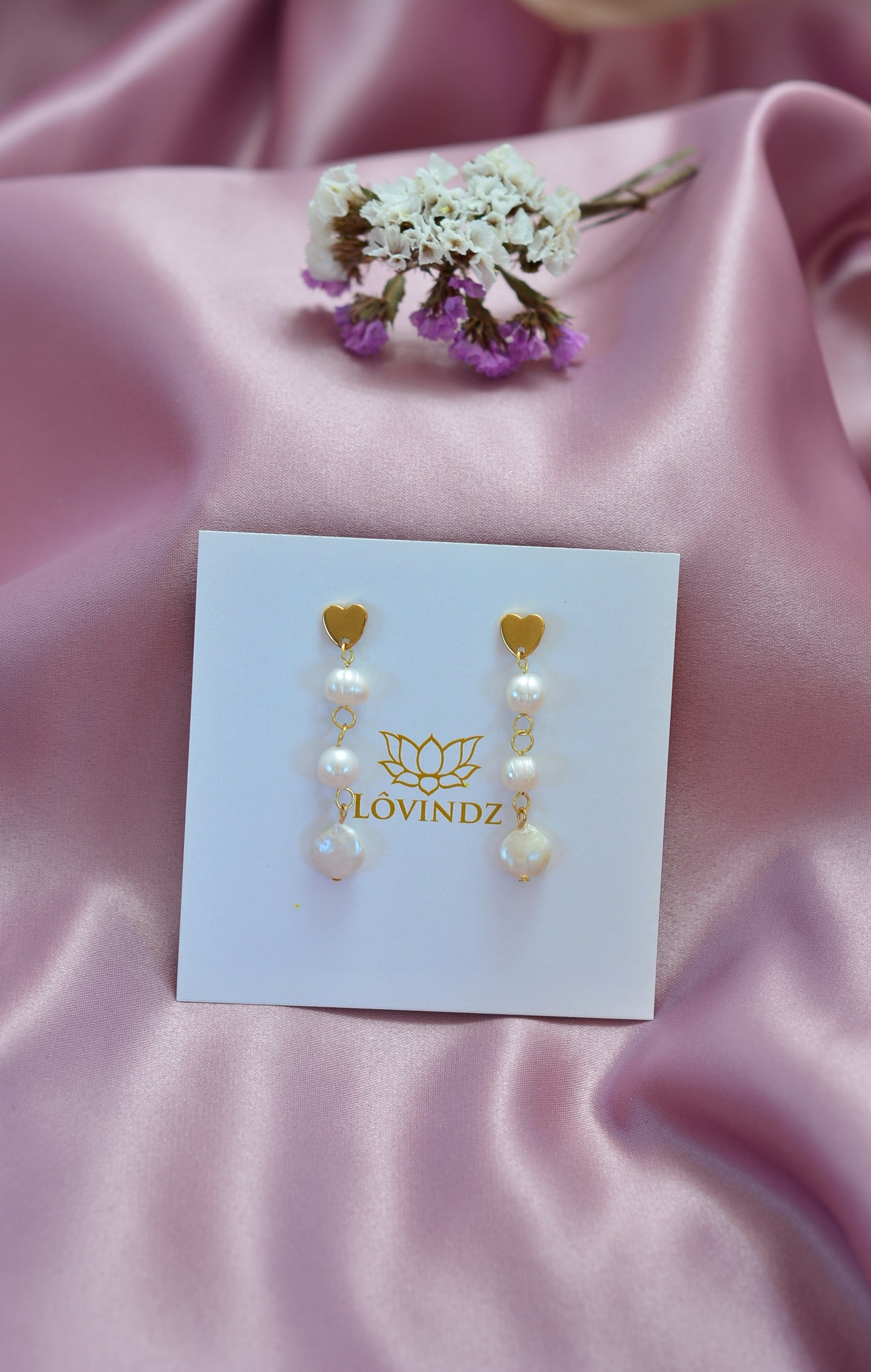 Aretes perla de rio