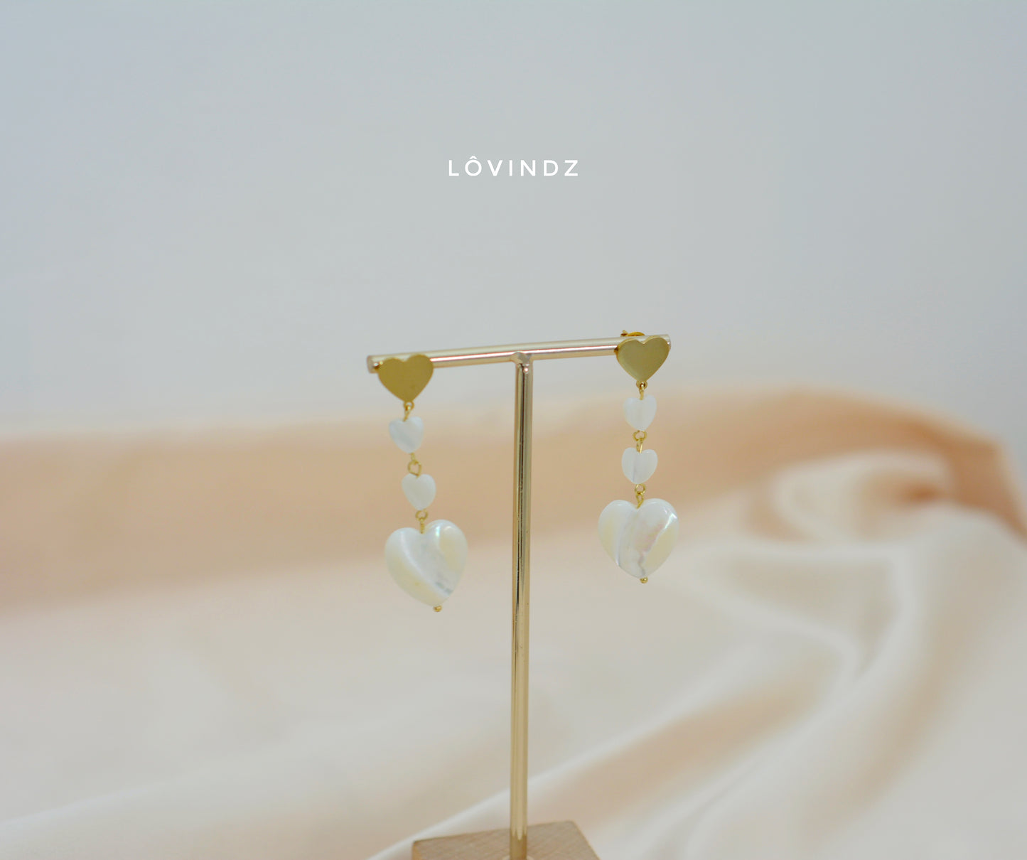 Aretes largos madre perla