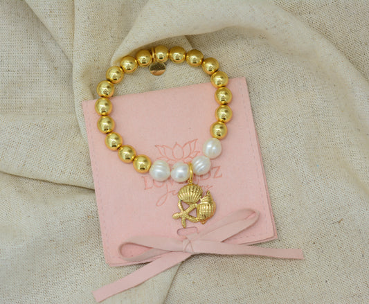 Pulsera concha, estrella y caracol