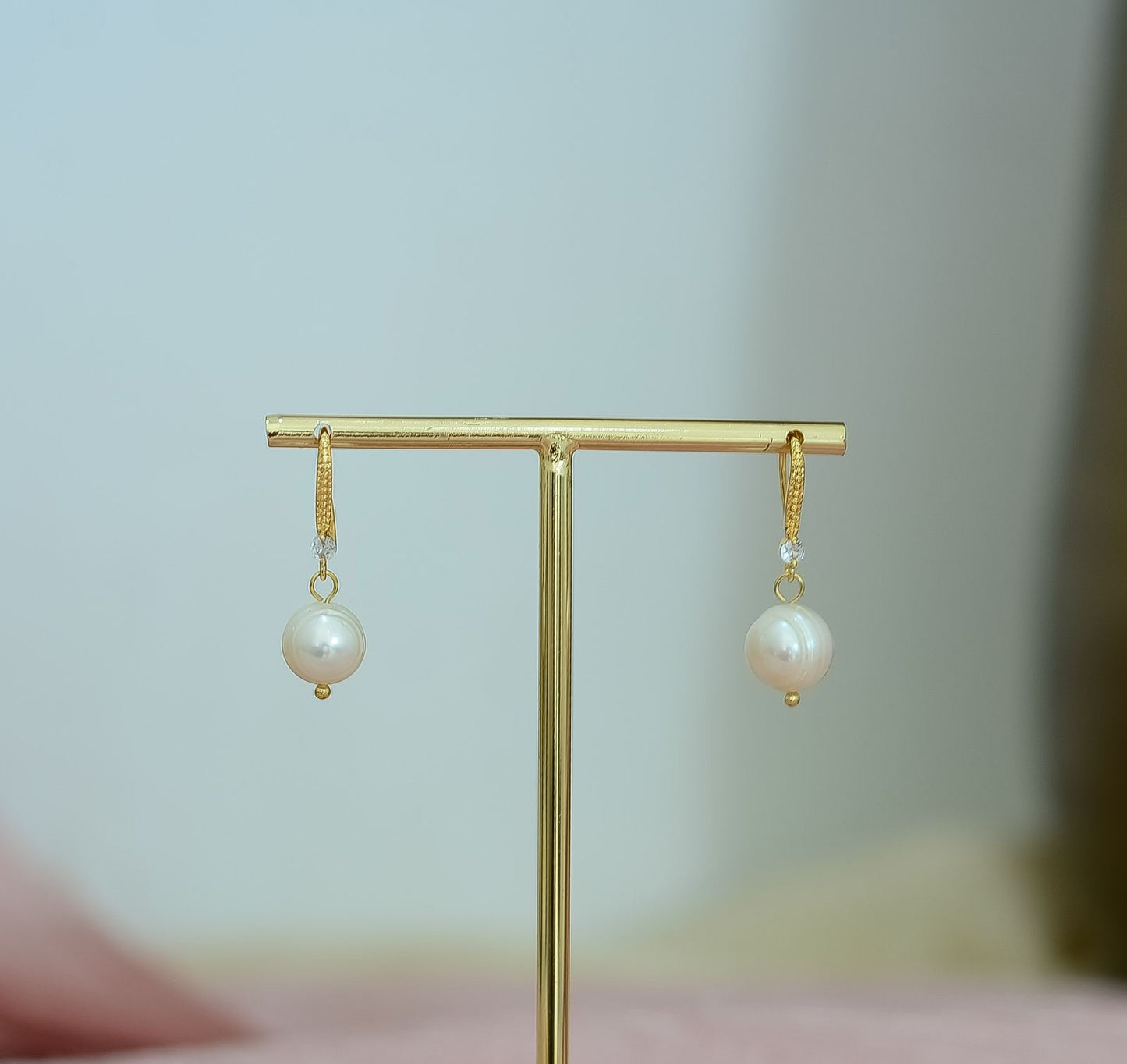 Arete perla redonda
