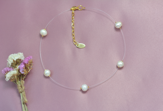 Collar flotante perla de rio