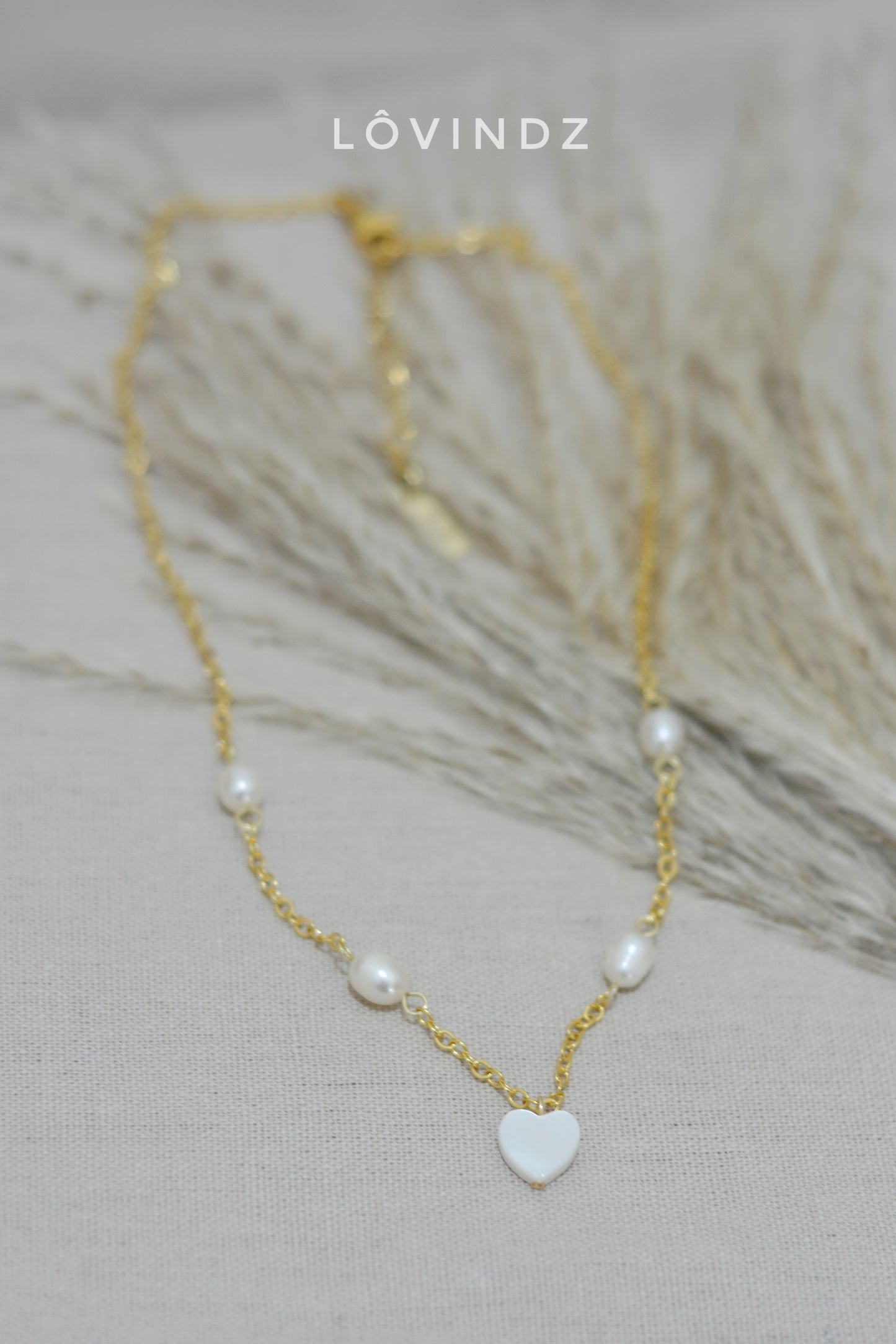 Cadena perla y corazón