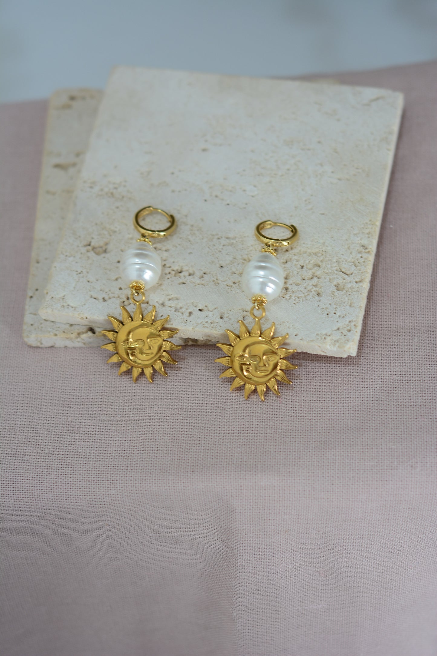 Aretes largos sol y luna