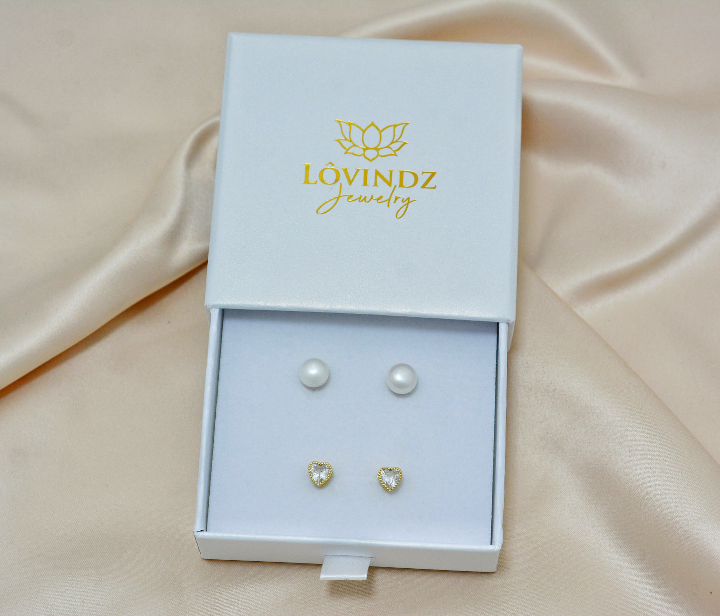 Juego de aretes