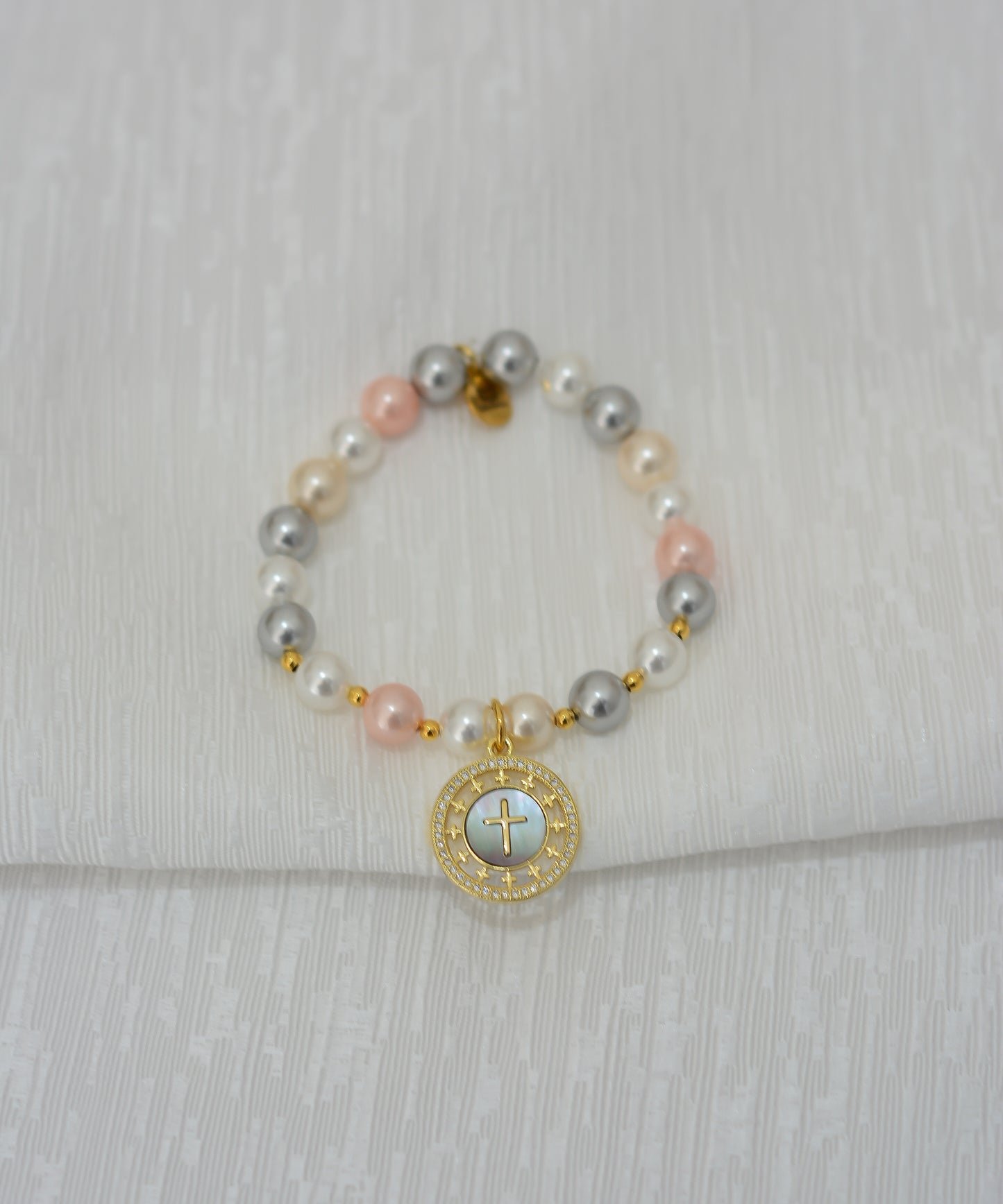 Pulsera cruz y madre perla