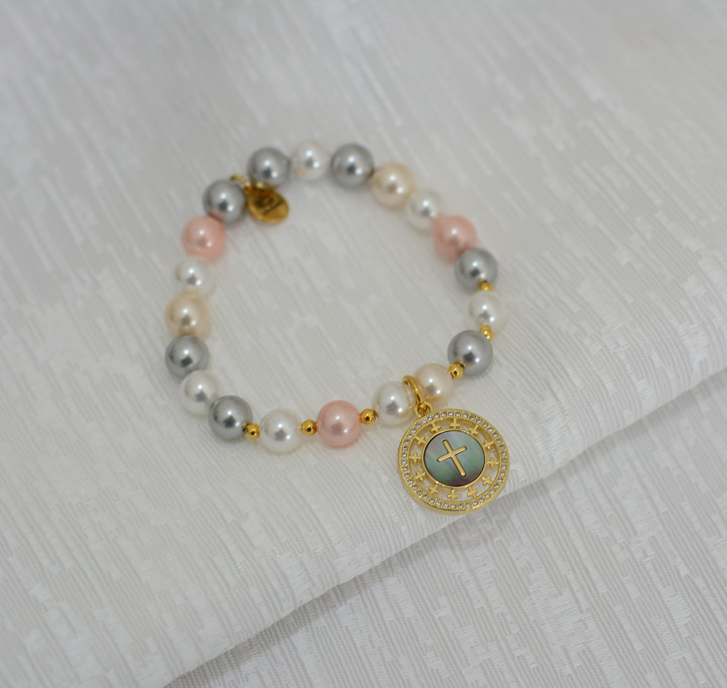 Pulsera cruz y madre perla